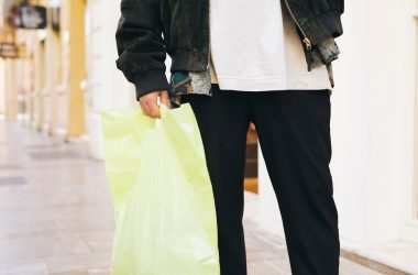low-section-man-carrying-plastic-bag-hand_23-2148175728